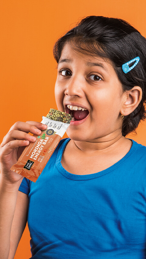 girl eating energy bar